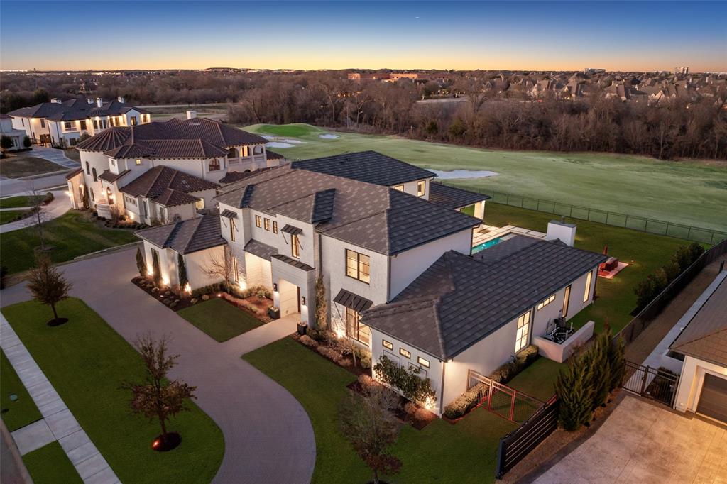 FABULOUS PRICE IMPROVEMENT. An incredible opportunity to own in the prestigious guard gated community of Wimberly Place, the only gated luxury community in Allen. A true custom offering with unique privacy and top-of-the-line construction throughout on a premier Twin Creeks golf course lot. This newer construction estate maximizes its footprint while leaving plenty of grass for entertaining and outdoor enjoyment. The home reflects today’s most desirable design trends and timeless appeal, blending transitional and modern accents. Enter through tall French iron doors into a light-filled interior where floor-to-ceiling glass showcases the resort-style pool and outdoor living areas, perfect for rest and relaxation. Chalky white museum-smooth walls and wide-plank white oak floors create a gallery-like backdrop for art and beautiful everyday living. The open kitchen, breakfast area, and family room connect seamlessly with a large walk-in bar, theater, and butler’s pantry- ideal for hosting or quiet nights in. The oversized primary suite offers a private retreat with spa-like ensuite bath and enormous closet, while a separate junior primary in-law suite sits on the opposite wing for privacy. Upstairs, a spacious lounge and game area connect to three well-appointed ensuite bedrooms, a secondary laundry room, creating an ideal layout for modern living. Built with extraordinary attention to detail and structural integrity by the sellers, including over 100 piers, foam insulation, concrete tile roof, imported stone flooring, select white oak floors, level 4 countertops, Wolf-SubZero appliances, built-in Miele coffee maker, two dishwashers, designer lighting, and tankless water heaters, EV charging stations. Priced below recent sales and turn-key for immediate occupancy. An exceptional opportunity to own in highly regarded Allen ISD and the golf community of Twin Creeks with easy access to all major roads.