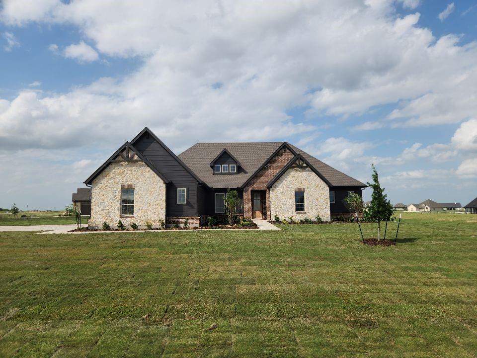 Estimated June2026 completion! Ask us about our Trade In Trade Up program, we can buy your home! This sprawling single-story sanctuary spans 3,104 square feet and offers 4 bedrooms and 3 bathrooms, perfectly curated for a life of luxury and comfort. As you enter through the charming covered porch, the foyer beckons you inside, setting the stage for the grandeur that lies within. On one side, a versatile flex room stands ready to evolve into your personalized haven, whether it be a home office, gym or creative space. On the opposite side, an oversized bedroom and bath. Continue through to the heart of the home, where the main living area unfolds—a vast family room with a cozy fireplace, an inviting nook and a chef-inspired kitchen boasting an elongated island, ideal for culinary adventures and entertaining. On one side of the home, discover the secluded owner's suite, offering unparalleled privacy and tranquility. Enjoy the luxury of a spacious walk-in closet and a serene bathroom, creating an oasis of relaxation. On the opposite side, two traditional bedrooms await, each complete with its own walk-in closet, accompanied by a shared bathroom—perfect for siblings or guests. Functionality reigns supreme with the laundry and mudroom conveniently situated just off the 3 car garage entrance. Finally, step outside to the expansive covered patio, seamlessly blending indoor and outdoor living and promising endless opportunities for relaxation and recreation. In the Mockingbird layout, luxury meets functionality, offering an unparalleled living experience for homeowners in DFW.
