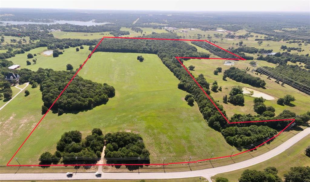 This 114-acre ag-exempt tract offers the kind of land and road frontage that’s getting harder to find in Cooke County. Located just outside Gainesville with approximately 1,600 feet of frontage on FM 3496, this property provides excellent access while still offering the privacy and elbow room buyers are looking for. The land is well-suited for a working ranch, single-family homestead, or a multi-generational family compound. With ample acreage and a strong layout, there’s plenty of room for a main residence, barns, livestock facilities, shops, and additional homes if desired. The extensive frontage allows for multiple entry points and long-term flexibility. The property is currently ag exempt, helping keep carrying costs low while allowing for continued agricultural use. For the recreational buyer, this tract also offers solid hunting potential, with space to manage wildlife, cut lanes, and enjoy recreational use. Quality acreage with road frontage, ag exemption, and location like this doesn’t come available often. This is a versatile piece of North Texas land suited for ranching, recreation, or long-term legacy ownership.