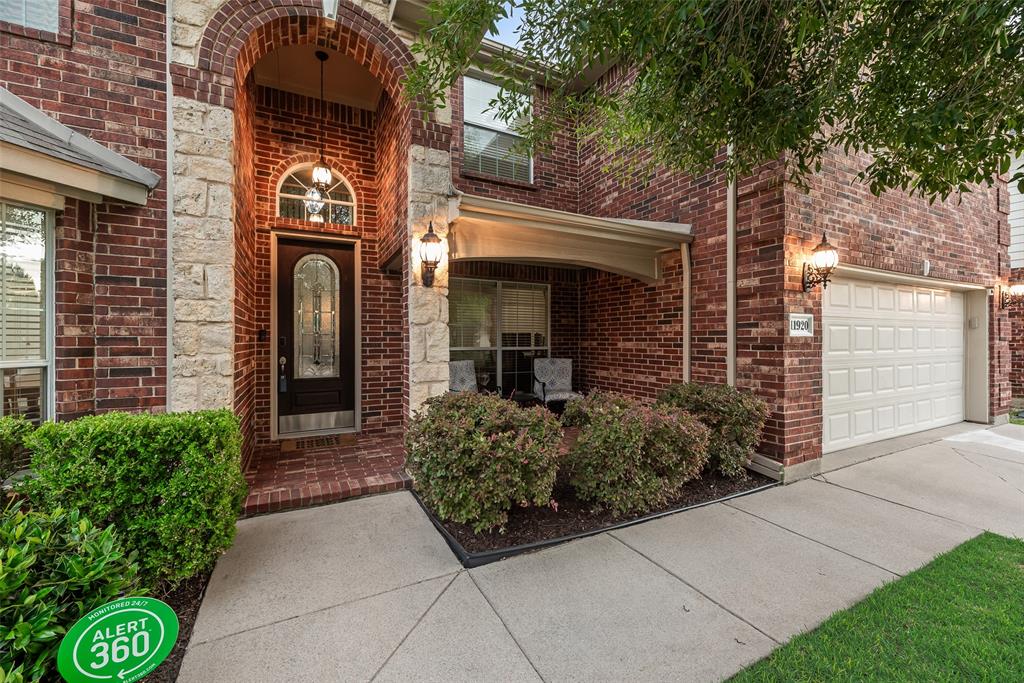 Impeccably maintained by its original owner, this expansive home offers 3537 sq ft of thoughtfully designed living with standout storage, flexible rooms and impressive indoor & outdoor spaces. A welcoming entry opens to rich engineered hardwood flooring that continues through the dining room, private office, and living area. The front office features a generous window overlooking the front porch and a closet for added functionality. The freshly painted kitchen blends sophistication & everyday convenience with granite countertops, a statement island featuring a quartz countertop & accent finish, gas cooktop, double oven, butler’s pantry or coffee bar, & an impressive walk-in pantry. The living room makes a memorable impression, showcasing 20 ft vaulted ceilings, a dramatic floor-to-ceiling stone fireplace with gas starter, a grand staircase, and expansive windows framing views of the backyard. The spacious downstairs primary suite offers new carpet, direct access to backyard and an ensuite bath. Upstairs a large loft game room features reinforced flooring, offering flexibility for a pool table, fitness space, or additional living area. Four bedrooms are privately positioned upstairs, including an oversized bedroom with large walk-in closet and Jack & Jill bath access, creating a comfortable secondary suite option. The 5th bedroom is currently styled as a media room & includes access to a 170 sq ft air-conditioned storage room not included in the published square footage. Outdoors, the 270 sq ft covered patio extends the living experience with outdoor speakers, a gas stub for grilling, a 220V plug for potential hot tub, newer privacy fence, & ample space for relaxing or entertaining. With a 5-yr old roof, 4-yr old fence and water heater, recently replaced coils in both AC units, & access to community pools, parks, trails, ponds, pickle ball courts, & Keller ISD, this home presents an exceptional blend of functionality, comfort & elevated design.