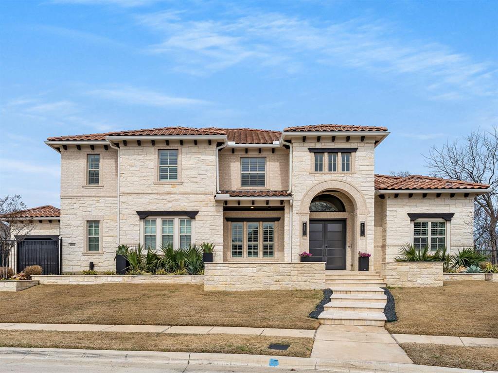 Southlake Gem with Designer Touches showcases a masterpiece of Luxury in this Stunning Custom Home where unparalleled upgrades & designer details shine! Nestled on a tranquil culdesac your welcomed to an open floor plan, exquisite hardwood floors, custom Restoration hardware lighting, private office with built-in cabinetry, spacious rooms and four living areas & formal dining room, perfect for entertaining. Upgrades found throughout include iron & glass front & folding patio doors, high-end finishes and countertops, decorative walls in bathrooms & cabinetry craftsmanship. Enjoy the spacious family room with built-in cabinetry & decorative gas fireplace. Phenomenal backyard oasis extends enjoyment with a sparkling Claffey pool with tanning deck, elegant water features and outdoor chef’s kitchen with Mongolian wok, grill and pergola for shaded relaxation. The chef’s kitchen is a showstopper, boasting top-of-the-line Wolf and Sub-Zero appliances with gas cooktop and double convection oven, honed marble counters, extensive prep space and custom wet bar. The luxurious primary suite offers a spa-like retreat with freestanding soaking tub, double shower and his & her closets with a storm shelter built into one. Guest room, large media room and separate game room offer built-in cabinetry and kitchenette completing the main level. Upstairs, you'll find three generous sized bedrooms with walk-in closets, 3 full size bathrooms and second game room with built-in entertainment cabinetry and a private balcony for perfect viewing of the annual July 4th Southlake Fireworks show. Step outside to your personal paradise with lush landscape providing privacy and expansive side yard with mature trees and direct access to the serene greenbelt with creek, creating the perfect blend of luxury and tranquility.