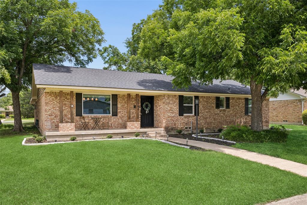 Thoughtfully updated and move-in ready, this single-story 4-bedroom, 2-bath home with a 2-car rear-entry garage sits on an oversized corner lot in desirable Claremont Park, offering a blend of modern updates, flexible living spaces, and a highly sought-after East Dallas location. The versatile floorplan features two spacious living areas, original built-ins, abundant natural light, and a brick fireplace overlooking the backyard. The renovated primary bath showcases calming blue tile, dual vanities, updated fixtures, and contemporary finishes. The kitchen blends style and function with quartz countertops, recessed lighting, fresh neutral paint, gold-toned accents, and updated appliances. Additional interior improvements include refinished oak hardwood floors, flooring in the hallway and office, updated lighting, custom closet organization systems, window shades in the primary bedroom, and a remodeled guest bath with updated plumbing. Designed for both everyday living and entertaining, the backyard has been transformed into a private outdoor retreat featuring a covered patio, refreshed landscaping, upgraded Zoysia grass, mature shade trees, updated flower beds, and a smart Rachio irrigation system. Thoughtful exterior investments include sewer line replacement, gutter guards, tree maintenance, and a fireplace cap. Ideally located near White Rock Lake, Whole Foods, Trader Joe's, Casa Linda Plaza, Lower Greenville, Lakewood, local restaurants, parks, and nearby schools. Enjoy easy access to a neighborhood park with walking paths and a newly constructed dog park, providing additional opportunities for outdoor recreation and community enjoyment. Combining thoughtful improvements, timeless character, and exceptional access to some of East Dallas' most popular destinations, this Claremont Park home presents a wonderful opportunity to enjoy the best of the area. Schedule your home tour today!