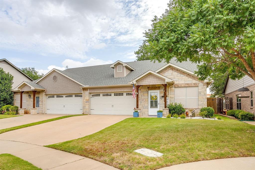 Enjoy low-maintenance living in this well-maintained 3-bedroom, 2.5-bath home in the sought-after Cobblestone Court community. The open floor plan offers a spacious living area that flows into the kitchen, complete with granite countertops, abundant cabinetry, and plenty of workspace. The primary suite is conveniently located downstairs, with two additional bedrooms upstairs.Recent updates include a 2023 roof, exterior paint, storm doors, solar screens, and gutter leaf guards, Relax on the rock patio or enjoy gardening in the raised beds. The HOA maintains the lawn with mowing, edging, and watering, making outdoor upkeep a breeze. Conveniently located near shopping, dining, and all that Granbury has to offer, this move-in-ready home is ready for its next owner!