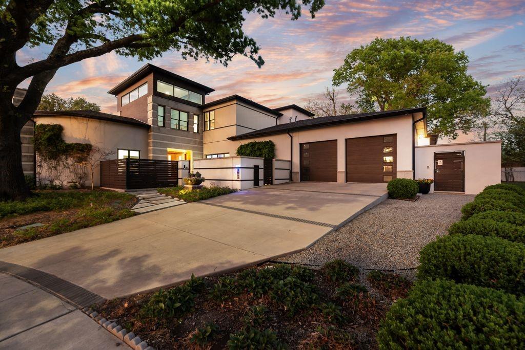 Positioned directly on the Brookhaven Country Club golf course, this steel-framed, concrete block modern estate sits on a rare double lot delivering uninterrupted fairway views, exceptional privacy, and a setting that cannot be replicated in this market. The construction alone separates this property from nearly everything around it. Steel framing and concrete block exterior walls are standards more commonly found in commercial and high-security construction than residential homes that create a level of strength, permanence, and structural integrity rarely seen in luxury real estate. A dedicated safe room, soaring ceilings, and dramatic walls of glass complete an architectural statement designed to maximize light, scale, and the connection to the course beyond. Inside, the open-concept layout flows through expansive living spaces, a chef’s kitchen, formal and informal dining areas, and a private primary retreat with spa-inspired bath, all thoughtfully oriented toward the golf course views. The seamless indoor-outdoor transition opens to a covered entertaining environment designed for elevated gatherings, quiet evenings, and resort-style living along the fairway. Additional highlights include a dedicated office, guest accommodations, premium designer finishes, and direct golf course frontage within one of DFW’s most established private club communities. For qualified buyers, the assumable 3.25% loan creates a rare financial advantage in today’s higher-rate environment, potentially delivering substantial monthly and long-term savings compared to current market financing. Land. Engineering. Privacy. Golf course frontage. A rate the market no longer offers. This is not builder-grade luxury. It is a privately engineered estate for the buyer who understands exactly what they are looking at.
