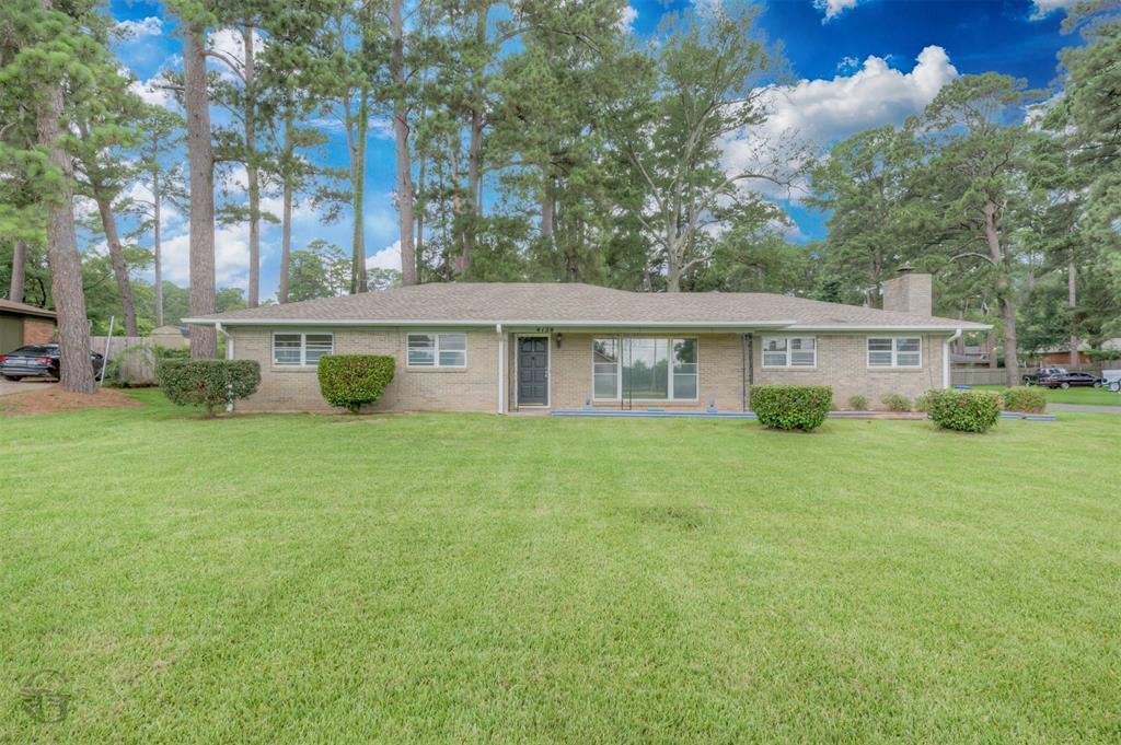 Towering Pines, a spacious corner lot, and Bill Cockrell Metro Park just across the street make this classic, brick ranch a rare find. Offering over 1,800 square feet, this well-maintained home features 3 bedrooms, two living areas, and a dining space, providing flexibility for entertaining and everyday living. Large windows throughout invite natural light and showcase the beautiful park-like setting. The unique primary bath suite offers separate his-and-her vanity and private water closet areas connected by a walk-through shower, providing exceptional privacy and functionality. Enjoy cozy evenings by the brick fireplace, abundant built-ins, and a spacious kitchen with all appliances remaining. Outside, the expansive yard beneath the mature pines creates the perfect setting for relaxing, entertaining, gardening, or just enjoying peaceful surroundings! With walking trails, tennis courts, playgrounds, swimming, and year-round recreation just steps away, this home offers a lifestyle as special as its location!