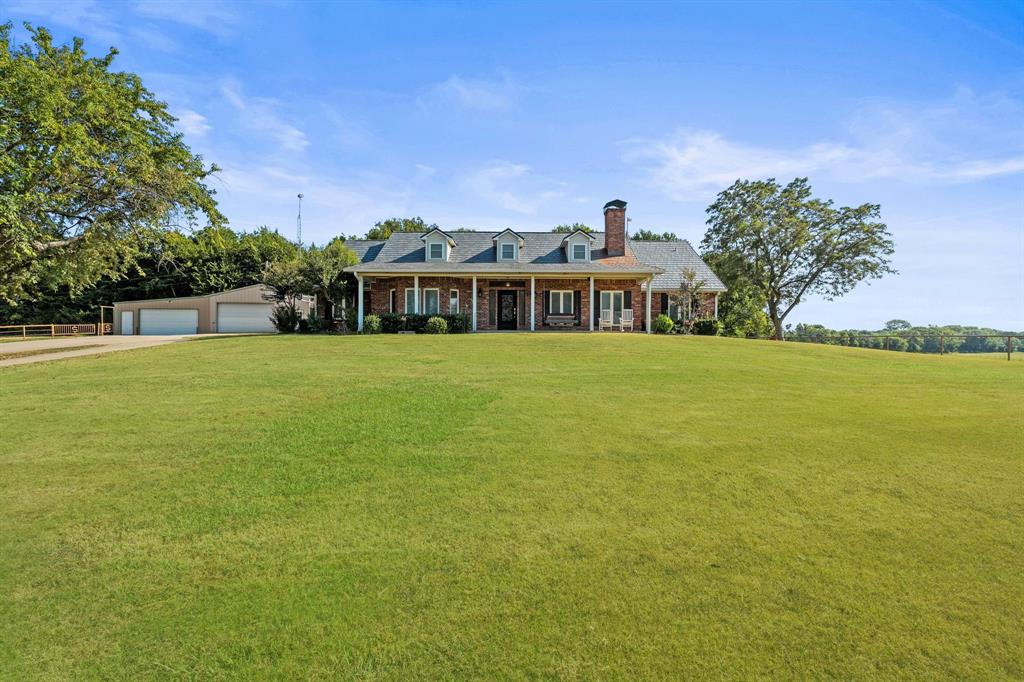 87± acre turnkey working horse ranch with strong income and lifestyle appeal. This well-maintained property is set up for equine use and hay production, with cross-fencing, improved pasture, and a productive hay meadow.
The ranch features a well-appointed 4-bedroom, 3-bath home, updated in 2013, offering comfortable living with views of the land. A large shop includes a guest house, ideal for visitors, staff, or rental income.
Equestrian improvements include an outdoor arena, a 4-stall barn with tack room, equipment barn, and ample space for expansion. The land is highlighted by mature pecan trees, a pond, and both frontage and scenic views along Sister Grove Creek, with an additional creek running through the property, providing natural water sources and excellent wildlife appeal.
Located directly off FM 1827 for easy access, just 15 minutes to McKinney, this property offers the perfect balance of rural functionality and proximity to town. Ideal for horse operations, recreational use, or investment with future potential. Ready for immediate use.