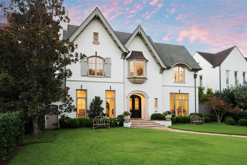 This exceptional & timeless English Eclectic home, custom-designed by renowned architect Larry Boerder, has been thoughtfully updated for modern living. Showcasing exquisite craftsmanship, w intricately carved millwork,complemented by clean lines & solid P&B construction. Spanning 3 floors plus a basement, the home features a Wine Tasting Room & cellar; 5 distinct living areas-including a formal living,den,library & billiard room. The 3rd floor offers a media room, gym or office, & a half bath. A fully equipped kitchen w Sub-Zero fridge, 3 ovens, warming drawer, Butler's Pantry & breakfast area, the home also offers abundant storage & multiple staircases w stylish iron railings leading to the upper floors with 5 ensuite bedrooms. Outside, a covered patio w a fireplace overlooks a stunning pool w water features, all surrounded by holly trees & lush landscaping.Truly one of the most outstanding homes in UP, this property represents the pinnacle of luxury living for discerning homeowners.