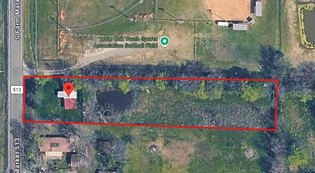 Rare opportunity to own a versatile 1 acre property in Lone Oak! This unique property features a metal shop, garage, or storage unit positioned on the front portion of the lot, offering excellent space for storage, hobbies, a workshop, or future possibilities. The back portion of the property is fenced and includes a pond, creating a peaceful outdoor setting with room to enjoy country living. Conveniently located next to the youth baseball fields and less than 10 minutes from Lake Tawakoni, this property combines small-town charm with recreational convenience.