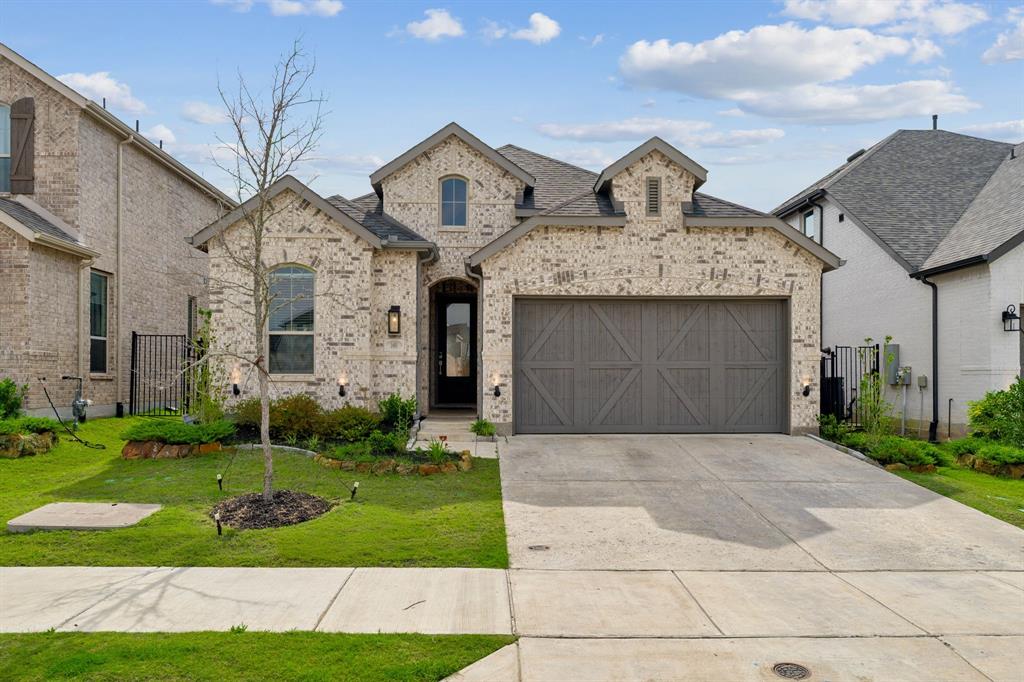 Welcome to this beautifully crafted 2024-built one-story brick home in the heart of rapidly growing Celina! Offering 1,956 square feet of thoughtfully designed living space, this 4-bedroom, 3-bath home combines modern style, comfort, and functionality. Step inside to an open-concept floor plan featuring luxury vinyl wood-look plank flooring throughout the main living areas, creating a warm and inviting atmosphere. The spacious family room boasts a corner fireplace, ceiling fan, and large windows that provide wonderful views of the backyard while filling the home with natural light. The chef-inspired kitchen is designed for both everyday living and entertaining, showcasing white cabinetry, quartz countertops, a farmhouse sink, gas cooktop, center island, breakfast bar seating, and abundant prep space. The kitchen flows seamlessly into the dining area and living room, making gatherings effortless. The private primary suite is a true retreat, offering a generous bedroom with a sitting area perfect for reading, relaxing, or creating a cozy workspace. Double doors lead to the luxurious ensuite bath featuring separate vanities, a garden tub, separate shower, and ample storage. Three additional bedrooms and two full baths provide flexibility for family, guests, or a home office. Carpet in the bedrooms adds comfort, while ceramic tile flooring in the bathrooms ensures durability and easy maintenance. Enjoy outdoor living from the covered front porch or unwind on the covered back patio overlooking the backyard. A 2-car front-entry garage completes this exceptional home. Located in one of North Texas' most desirable and fast-growing communities, this move-in ready home offers modern finishes, an ideal layout, and convenient access to shopping, dining, schools, and major commuter routes. Don't miss this opportunity to own a nearly new home in thriving Celina!