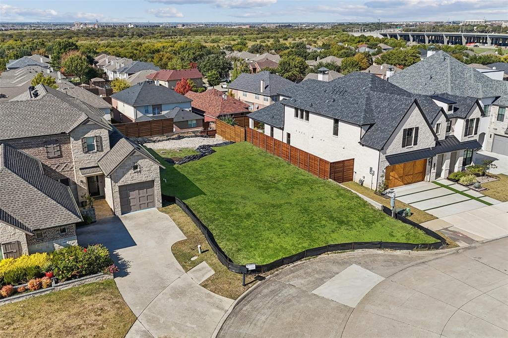Build Your Dream Home in Prestigious Wyndsor Pointe! Discover one of the last remaining opportunities to build your custom home in Frisco’s exclusive gated Wyndsor Pointe community. Perfectly positioned between two beautifully completed homes, this interior lot offers a prime setting for your future dream residence. The neighborhood is nearly fully developed—making this a rare chance to secure your place in this highly sought-after enclave. With several approved custom home builders ready to bring your vision to life, you can design the home that truly reflects your style and needs. Enjoy the peace and privacy of a gated community, complete with lush greenbelts, scenic walking trails, and front yard maintenance included for easy living. Ideally located in the heart of Frisco, you’ll be close to premier shopping, dining, and entertainment while enjoying the serenity of a refined neighborhood. Don’t miss this opportunity—lots like this in Wyndsor Pointe are becoming increasingly hard to find! The Lot has experienced retaining wall failures in the past. Buyers and Agents to Verify All Information Available.