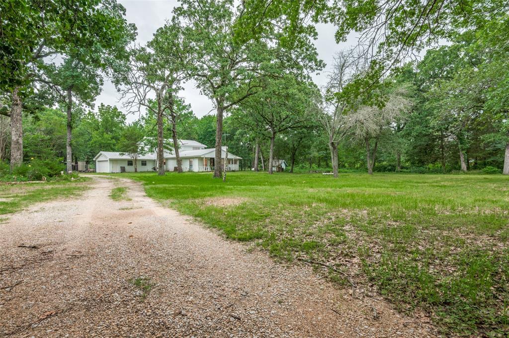 This unique two-story property sits on nearly 6 acres, with the option to acquire an additional 2.6 acres, offering endless possibilities for living, entertaining, and investing.
The property features a pond, barns, outbuildings, outdoor built-in grills, and a game room perfect for hosting gatherings, creating income opportunities, or building the retreat you’ve always envisioned! 
Located near Cedar Creek Lake and Kings Golf Course, you’ll enjoy peaceful country living with convenient access to recreation and nearby amenities. Rarely does a property offer this much flexibility, land, and potential in one location. SOLD AS-IS

Schedule your private showing today and come experience a property where the possibilities are truly endless!
All information provided in the MLS to be verified by the buyer and buyer's agent including measurements, schools, taxes, etc