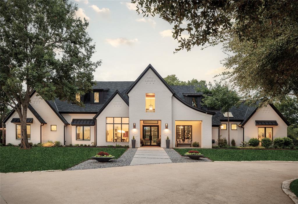 Welcome to a masterpiece of modern sophistication and tranquil living set on a sprawling, gated, 6+ acre property across from Oak Point Park and Nature Preserve, where 800 acres of trails, a lake, and serene landscapes await. Step inside to soaring 15-foot ceilings, 7-inch wide white oak plank flooring, Pella windows and doors plus two Heat and Glow Primo 60 fireplaces with sleek porcelain surrounds. The open floor plan seamlessly connects the main living areas, while the gourmet kitchen boasts top-of-the-line GE Monogram appliances, a massive Black Diamond leather honed granite island, and solid oak reclaimed beams for a warm yet modern touch. The primary suite is a private retreat with a spa-inspired bath, featuring heated porcelain floors, double custom vanities, a double walk-in shower with a translucent Iceberg Extra Quartzite wall, and double walk-in closets with washer & dryer connections and LED lighting. The home also includes a bar room, a butler’s pantry with LED-lit cabinetry, and thoughtful technological integrations like Sonos sound, mesh wireless internet, and a low-voltage LED lighting sys. This property offers an entertainer’s paradise of outdoor living with two large climate-influenced patios featuring heaters and retractable screens, a Riverbend Sandler play pool, a spa with IPE decking and a louvered cover, and a cabana complete with a bar, half bath, and fireplace. The estate boasts exceptional versatility with a 4,000 sq. ft. workshop (including office space and a full bath), a mechanic’s garage with a 9,000 lb car lift, SubZero refrigerator, and custom glass garage door, and a 3-stall horse barn equipped with a feeding room, loft, wash area, central heat, and security cameras. Meticulously landscaped with a 20-zone irrigation system, a separate turf pet area, and oversized gutters, the exterior offers both beauty and practicality. Experience a lifestyle of luxury, privacy, and convenience in this remarkable estate—your serene sanctuary awaits!