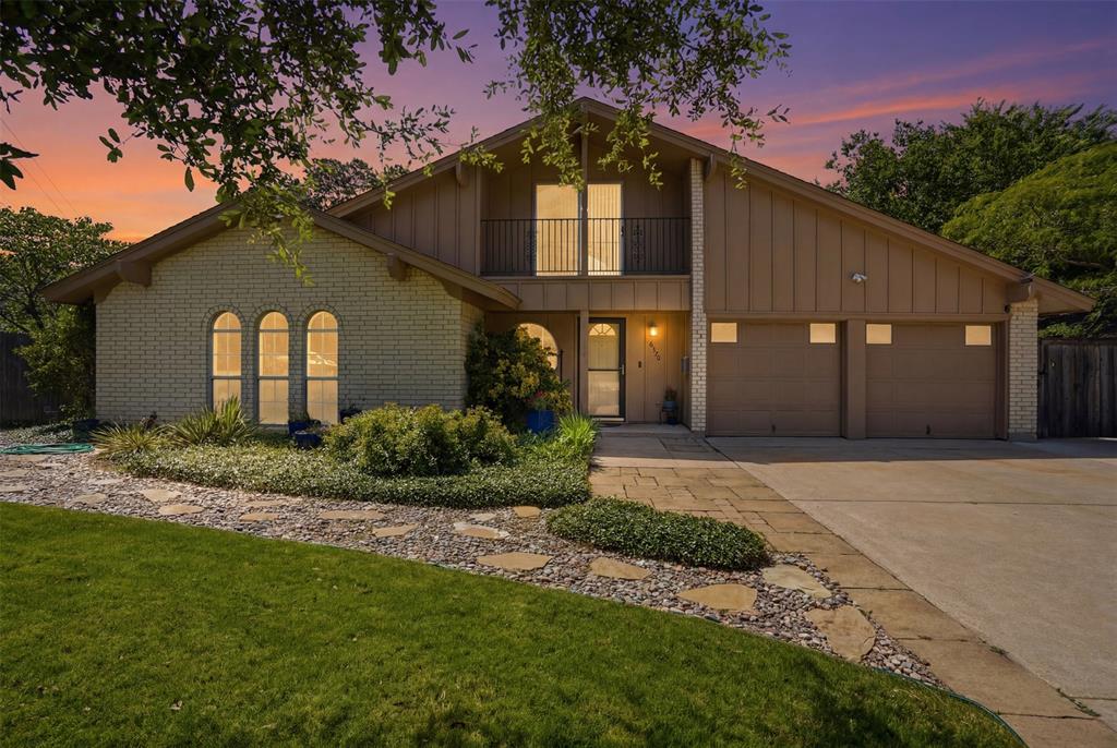 Beautifully updated home on large landscaped lot in the heart of Wedgwood! This property sits on a charming, tree-lined street & welcomes you with great curb appeal &  2 car garage with work benches. Inside, you’ll find bamboo & tile flooring, sunken living room with raised, beamed ceilings & wood-burning fireplace with raised brick hearth along with an eat-in, renovated, built-in chef's kitchen with granite countertops, glass tile backsplash, slate stainless steel appliances & butler's pantry with coffee bar & lighted, custom glass shelving display. Additional features are arched sheetrock, remodeled primary bath with walk-in tile shower & abundant cabinetry & additional storage in multi-purpose loft that could double as a home office, recreation room or whatever fits your needs. Enjoy outdoor living on the pergola, covered patio with park-like, lushly landscaped back yard with storage building. This one truly shines—move-in ready just in time for summer! Welcome home!