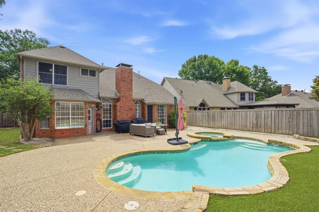 Located in the highly sought-after Stonebridge Ranch master-planned community, this 4-bedroom home offers 2,792 square feet of living space, a private pool and spa, and a desirable floor plan for both everyday living and entertaining. The first-floor primary suite provides convenience and privacy, while soaring vaulted ceilings and abundant natural light create an open, inviting atmosphere throughout the home. The spacious layout includes multiple living and dining areas. The primary suite features an ensuite bath with dual sinks, separate shower, and walk-in closet. The open-concept kitchen is equipped with granite countertops, a center island, pantry, double ovens, and a breakfast area that flows seamlessly into the main living spaces. A fireplace anchors the family room, creating a comfortable gathering space. Upstairs, a large game room provides flexible space for recreation, media, work, or a second living area, along with three additional bedrooms and a full bath. Large windows throughout the home enhance the bright and airy feel of the living spaces. Step outside to enjoy your own backyard retreat featuring a sparkling pool and spa. Residents enjoy access to Stonebridge Ranch amenities, including community pools, tennis courts, pickleball courts, parks, playgrounds, fishing areas, greenbelts, and miles of walking and biking trails. Conveniently located near shopping, dining, entertainment, and major commuter routes, this home offers access to the amenities and lifestyle that make Stonebridge Ranch one of McKinney's most desirable communities. A rare opportunity to own a pool home with a first-floor primary suite in one of McKinney's premier master-planned neighborhoods, offering the perfect combination of space, comfort, community amenities, and resort-style outdoor living.