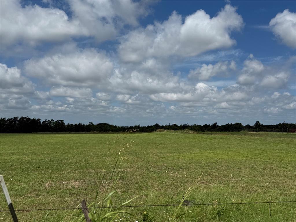 This property is a perfect blank slate for bringing your vision to life.  Whether it be a brandominium, manufactured or brick home, this acreage has plenty of room for you family's dream. With seller financing available the land offers plenty of opportunity for flexible financing options.  Drive by today and see this great location that could soon be yours! 
Lot J and Lot K are also listed and available to be sold as individual 1 acre lots.  See listings mls #21069087 and 21069097
