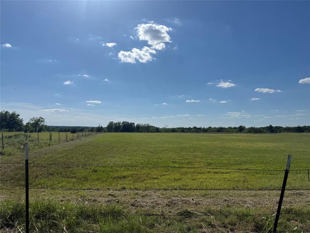 This property is a perfect blank slate for bringing your vision to life.  Whether it be a brandominium, manufactured or brick home, this acreage has plenty of room for you family's dream. With seller financing available the land offers plenty of opportunity for flexible financing options.  Drive by today and see this great location that could soon be yours! 
Lot J and Lot K are also listed and available to be sold as individual 1 acre lots.  See listings mls #21069087 and 21069097
