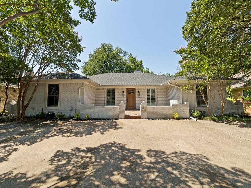 Nestled in the heart of Forest Meadows and just minutes from Lake Highlands, this well-maintained 3-bedroom, 2.5-bath home offers 2,481 square feet of space, character, and opportunity in one of Dallas' most desirable established neighborhoods. Featuring a game room, formal dining room, sunroom, and multiple living spaces, the flexible floor plan provides room to live, work, and entertain.

The spacious living room is anchored by a cozy fireplace and showcases original built-ins that add both charm and functionality. Rich wood paneling brings warmth and character throughout the home, embracing a classic design element that is making a comeback in today's interiors. Additional built-ins in the breakfast nook offer the perfect place for display, storage, or a coffee bar.

The sunroom provides endless possibilities and could easily serve as a home office, reading room, hobby space, or additional living area. A generous game room adds even more flexibility for entertaining, recreation, or a second living space.

Situated on a generously sized lot, the property features a circular driveway, rear alley access, a detached 2-car garage, and an additional 2-car covered carport, providing exceptional parking and storage options.

Owned and cared for by the same owners for many years, this home reflects true pride of ownership. While it offers the opportunity for cosmetic updates, it has been lovingly maintained and presents a rare chance to personalize a home to your own style and preferences. Rather than paying a premium for someone else's design choices, you'll have the freedom to create a space that reflects your vision while preserving the character and craftsmanship that make this home special.

Located within Richardson ISD and close to shopping, dining, parks, and major commuter routes, this Forest Meadows gem offers the ideal combination of location, space, character, and potential.