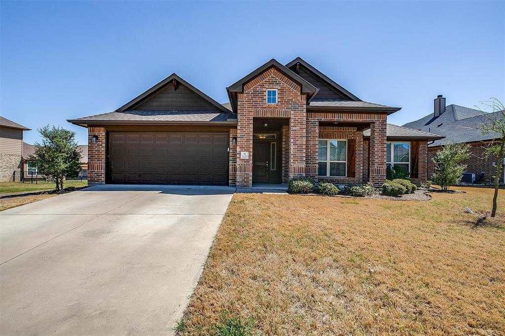 PRICE REDUCTION!! SPRING into this beautiful home in the JOSHUA ISD!! This well-maintained 4-bedroom, 2 bath home in Burleson, located in the highly sought after in the Joshua ISD, offers 2261 sq ft of living space with a 2 car garage and backs up to a greenbelt. The home features a spacious primary bedroom and master bath with dual sinks, a walk-in closet, a garden tub, and ceiling fans. The secondary bedrooms are spacious and carpeted and equipped with ceiling fans. The 4th bedroom could serve as a dedicated office with French doors. The open floor plan allows freedom to move about and entertain family and guests and also features a nice kitchen with granite countertops, an island, and walk-in pantry. The backyard is spacious and offers plenty of room for pets to run or even install a pool. The community offers lakes, pool, walking trails, and a basketball court making the neighborhood the perfect place to relax and entertain. Agents, come and see! Schedule your showing now and make this home a forever home for your client.