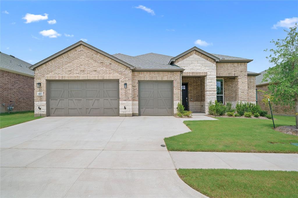 Experience one of the finest homes available in Del Webb at Trinity Falls, showcasing over $164,000 in builder-selected upgrades and enhancements beyond an already exceptional floor plan. Thoughtfully designed and only lightly lived in, this residence reflects the level of detail and craftsmanship typically reserved for custom homes.

The highly sought-after Echelon Series represents the premier finish-out package offered by Del Webb, and this home takes it even further. The heart of the home features elevated cabinetry, upgraded appliances, a built-in beverage center, designer lighting, and an open-concept layout ideal for both everyday living and entertaining. Luxury vinyl plank flooring extends throughout the main living areas, creating a seamless and sophisticated feel.

The private owner's retreat offers a spa-inspired bath with upgraded cabinetry, countertops, hardware, and finishes selected to create a refined and relaxing space. Additional highlights include a deluxe laundry room, custom mud bench area, smart home technology package, tray ceiling detail, and an added third bedroom providing flexibility for guests, hobbies, or a home office.

Enjoy true indoor-outdoor living with expansive sliding glass patio doors opening to a covered outdoor space complete with pre-installed flatwork for a future outdoor kitchen. The oversized three-car garage is equally impressive, featuring epoxy-coated floors and upgraded finished walls with trim details rarely found in new construction.

Every selection was carefully chosen by the original owners during construction, creating a home that stands apart from typical builder inventory. A rare opportunity to own one of the most upgraded homes in Del Webb at Trinity Falls without the wait of new construction.