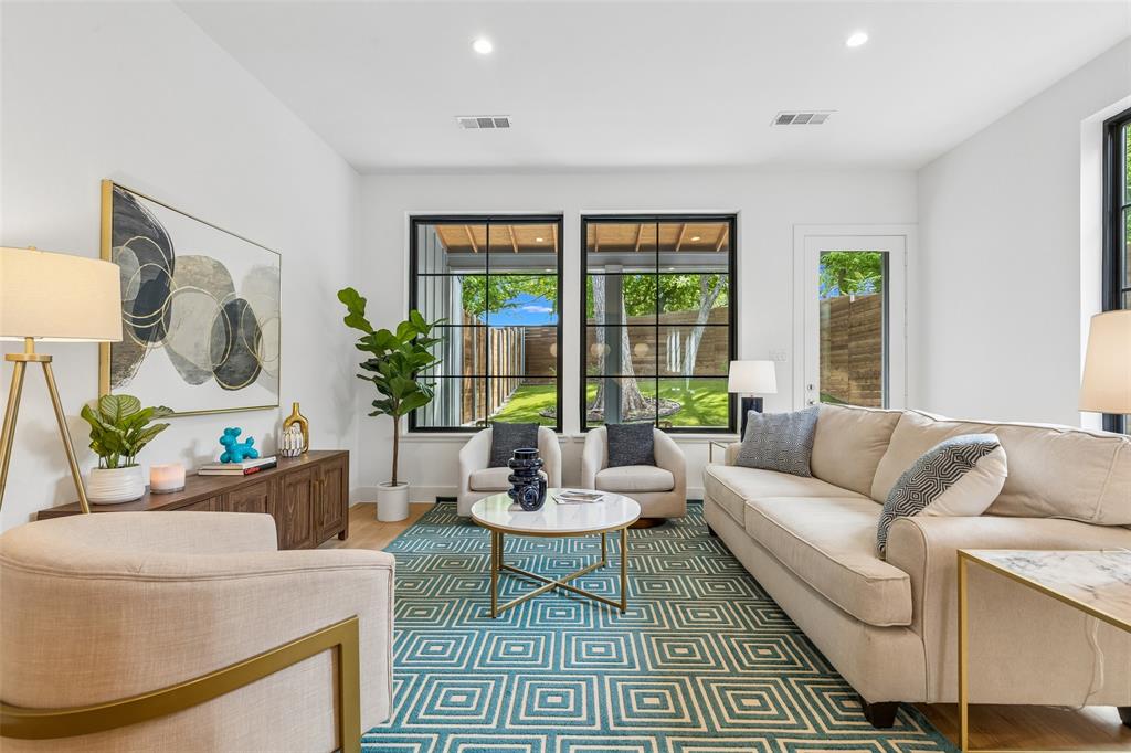 Enjoy the best of North Oak Cliff living in this modern 2023-built home just minutes from Bishop Arts District, Kidd Springs Park, Methodist Dallas Medical Center, and Downtown Dallas. Combining stylish design with exceptional functionality, this single-family attached residence offers a rare opportunity in one of Dallas’s most vibrant neighborhoods.
The open-concept floor plan features 3 bedrooms, a dedicated office, and 2.5 baths, creating flexible spaces for both everyday living and entertaining. Large windows and tall ceilings bring in abundant natural light, while wood flooring throughout enhances the home’s clean, modern aesthetic.
The kitchen serves as the heart of the home with a generous quartz island, gas range, designer finishes, and direct access to the living and dining areas. Outside, the covered patio overlooks a private turf yard shaded by mature trees, offering a low-maintenance outdoor retreat.
The upstairs office or flex space provides additional versatility, while the spacious primary suite features a walk-in shower, dual vanities, and ample closet space. Located on a quiet tree-lined street, this home delivers the walkability, lifestyle, and convenience buyers seek in North Oak Cliff.