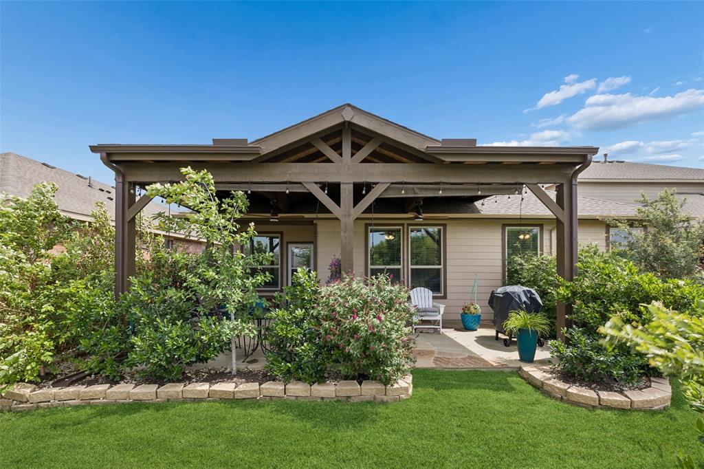 *Assumable VA loan with rate of 4.99% available!* Located in the Northstar community of Haslet Texas in Denton County & zoned to Northwest ISD, this 4 bedroom, 2 bathroom home offers approximately 2,038 square feet of single story living near US 287, Interstate 35W & Highway 114. The location provides convenient access toward Alliance, Fort Worth & DFW Airport, while remaining minutes from Alliance Town Center, Tanger Outlets, Texas Motor Speedway, shopping, dining & major employment centers. Buyers exploring homes in Northstar in Haslet Texas may appreciate the combination of newer construction, community amenities & convenient commuter access. If you are searching for 4 bedroom homes in Haslet Texas within Northwest ISD, the layout offers open concept living spaces, a dedicated office nook & flexible design for everyday living and entertaining. The kitchen features a gas cooktop, gas oven, oversized island, pantry storage & abundant cabinetry, overlooking the spacious living & dining areas. The primary suite provides a private retreat with dual vanities, separate shower & a large walk-in closet. Interior highlights include luxury vinyl plank flooring, decorative lighting, tankless water heater, security system, insulated garage door & a separate utility room with space for a freezer. Outdoor living centers around a flagstone-covered patio with dual ceiling fans & dedicated electrical outlet for grilling, overlooking open space and a beautifully landscaped backyard with mature trees, shrubs & established flowering plants. Storage & parking include a 2 car garage with workshop space. Residents enjoy Northstar amenities including a community pool, clubhouse, playgrounds, trails, green spaces & an on-site elementary school. An assumable VA loan with a 4.99% interest rate is available for qualified buyers. This property offers a strong combination of newer construction, outdoor living & positioning within the Haslet Texas market near the Alliance corridor.