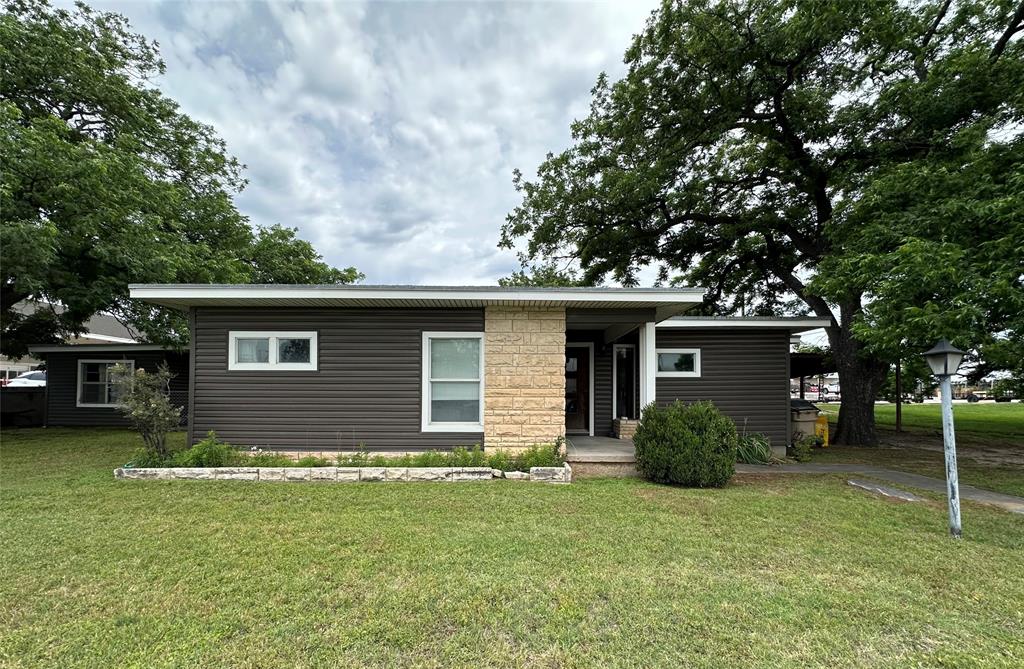 Great location!  This home could be commercial or residential.  The main house is a 2 bed 1 bath and the guest house is a one bedroom with bath attached.  Laundry on the backside and could be made into a small kitchen if you needed an in law suite, perfect for a rental and double income, or just a great house with an additional bonus room outside or shop!  There's also a storage building, the yard is great and large.  It's fenced.  There's a water well, and a carport.  This is an estate.