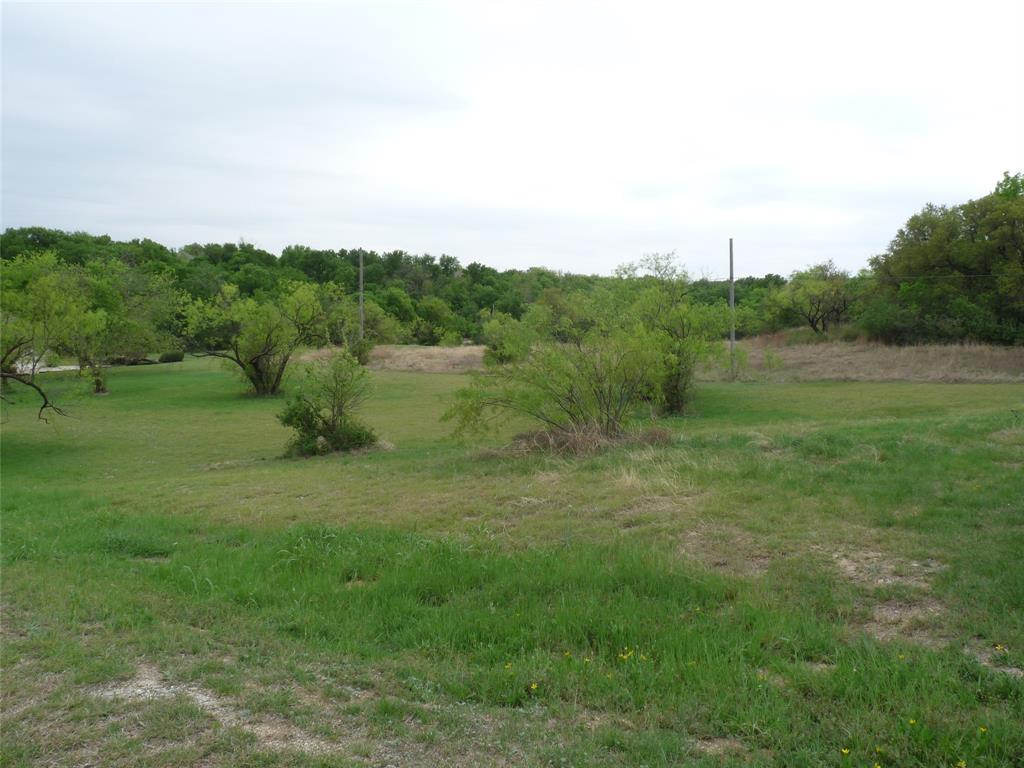 Your future homesite awaits in the sought after Runaway Bay community! This ready to build lot is perfectly positioned near the golf course and just moments from Lake Bridgeport, offering endless opportunities for boating, fishing, and outdoor fun. Utilities including city water and sewer, electricity, internet, and cable are available, making it easy to bring your vision to life. Bring your builder and start turning your dream home into reality! Need more space? This is one of three available lots, and the seller is open to selling all three together, an excellent opportunity for a larger homesite or investment potential! The MLS # associated with the other two lots are 21224490 & 21224502