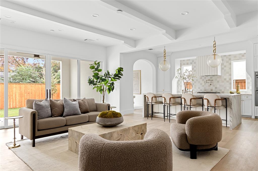 Designed by Jessica Koltun Home, this breathtaking new construction in Dallas's prestigious Lakewood neighborhood redefines luxury living with timeless elegance and modern sophistication. Spanning 5,041 square feet, the residence offers 5 bedrooms and 5 bathrooms, masterfully crafted for elevated living, effortless flow, and enduring curb appeal.
Inside, abundant natural light showcases refined materials, soft tones, and bespoke architectural detailing throughout every room. The open-concept floor plan seamlessly connects expansive living and dining areas to a designer chef's kitchen appointed with custom cabinetry, professional-grade appliances, and an oversized center island—the true heart of the home and an entertainer's dream.
The first floor features two bedrooms, including a stunning primary suite offering a private retreat complete with soaring vaulted ceilings, a spa-inspired bath, and a generous walk-in closet. Upstairs, additional en-suite bedrooms and flexible living spaces deliver comfort, privacy, and versatility to suit every modern Dallas lifestyle.
From the moment you enter, every curated detail reflects the signature Jessica Koltun Home aesthetic—a sophisticated blend of warmth, luxury, and enduring style—perfectly positioned near White Rock Lake in one of Dallas's most sought-after neighborhoods. This is more than a home; it's a statement in refined new construction living.
