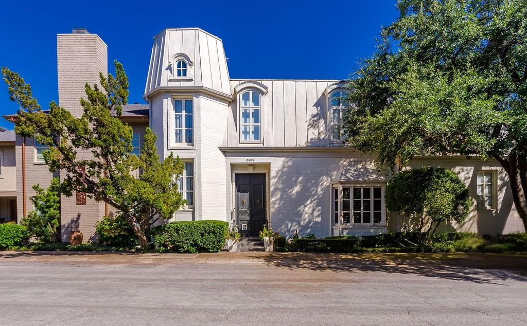 Stunning, one-of-a kind property located near the West Highland Park neighborhood! Two story home presents a versatile floor plan with two inviting living areas and separate dining room with soaring ceiling and French brown hand laid wood floors, perfect for both entertaining and relaxing. The large great room has built in bookshelves, floor to ceiling patio doors that lead out to turfed courtyard yard. Beautiful kitchen overlooks the side yard equipped with stainless steel appliances. The home has two spacious bedrooms each with walk-in closets, including a private primary retreat with separate jacuzzi tub and walk in shower, the primary suite also has beautiful fireplace. The 2nd bedroom has an ensuite bath with custom vanity and lighting. Additional features include a newly added dumbwaiter, custom drapes, custom wallpaper, beautiful light fixtures throughout, two car garage, upstairs dry bar, and private side yard. Priced and ready to sell!