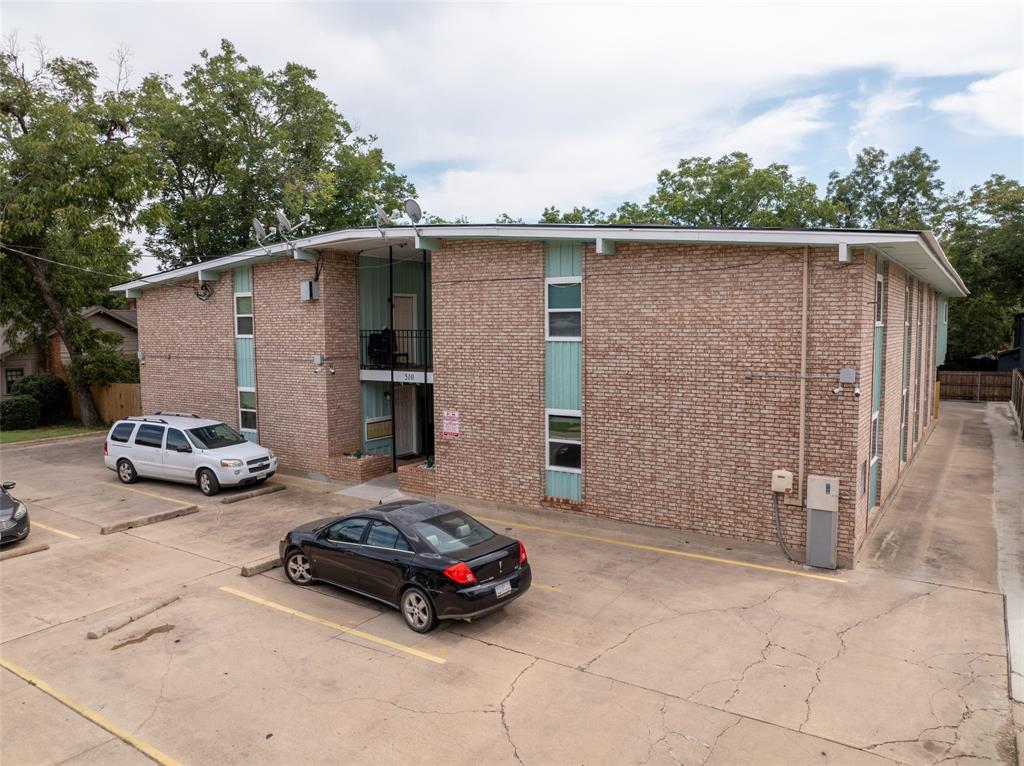 Rare opportunity to invest in a multi-family property within walking distance of Texas Women's University, less than one-half mile walk and a 2 minute drive. It's also less than 5 minutes to the historic popular downtown Denton square with its many restaurants, shopping and entertainment choices. That makes this a highly desirable location and these don't come on the market very often. There are 14 units; 8 2-bedroom units and 6 1-bedroom units. There are 25 parking spaces, including 6 covered spaces, which actually exceeds the city's requirements. The roof is new this year, custom designed.. Ask us about the special construction and installation. The water heaters are new in 2025; AC system 2019; boiler in 2019 also. Eleven of the apartments have been remodeled and we have a list of other upgrades available. There is a laundry room onsite with multiple washers and dryers, new in 2024. This property is extremely well maintained and of course you won't find a better location. Give me a call and we can schedule your appointment.. The listing agent has financial and tenant information including pro forma rent numbers. This property will be part of a 1031 Exchange.