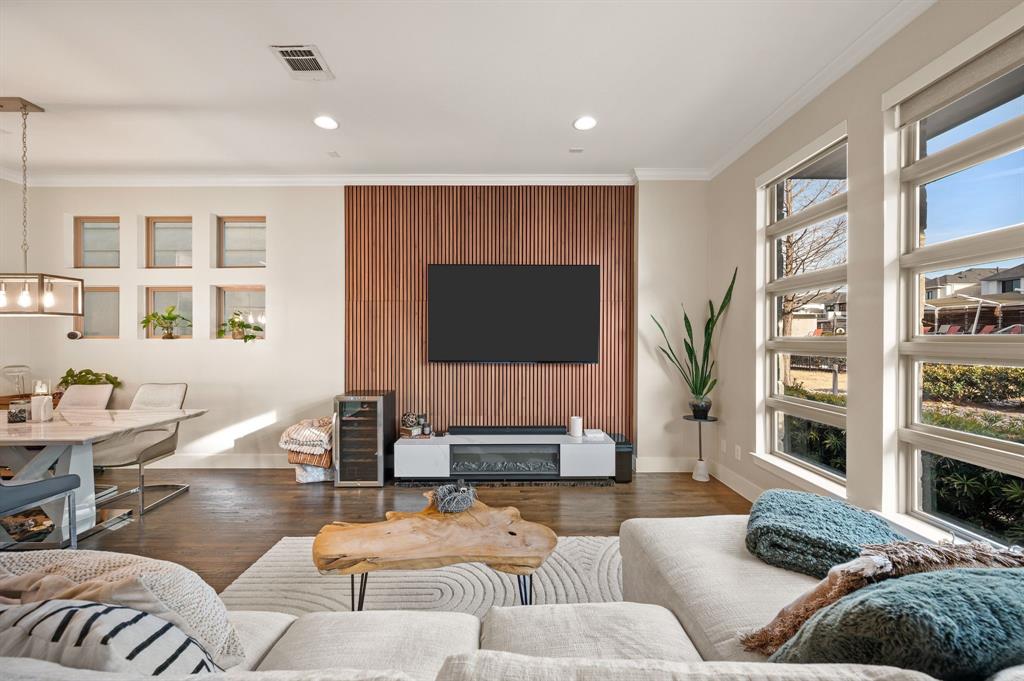 Meticulously maintained and richly upgraded, this exceptional two-story K. Hovnanian home is ideally positioned on a premium corner lot with an expansive setback and picturesque views of the community pool and grounds. Thoughtfully designed with 3 bedrooms and 2.5 baths, the home welcomes you through an impressive 8-foot solid mahogany front door and into a light-filled, open architectural layout accented by refined hardwood floors and rounded sheetrock corners throughout. The gourmet kitchen features a elegant quartz countertops, a large center island, undermount sink, walk-in pantry, stainless steel appliance package, 5-burner gas cooktop, and double ovens—perfect for both everyday living and entertaining. Additional highlights include programmable electric blinds throughout, whole-home sound wiring, a built-in desk with custom cabinetry, and abundant natural light. The spacious primary suite offers a serene retreat with a generous ensuite bath and access to a substantial patio overlooking the beautifully maintained community pool. Energy-efficient features include Low-E windows, radiant barrier decking, tankless water heater, zoned irrigation, security system, and Energy Star 3.0 certification. Residents enjoy direct access to the White Rock Trail for biking and walking, a professionally managed private dog park, and a vibrant, low-maintenance community lifestyle. Ideally located near White Rock Lake, the Dallas Arboretum, NorthPark Center, and major medical centers, with easy access to shopping, dining, and commuter routes—this home blends elevated design, modern efficiency, and an unbeatable East Dallas location.