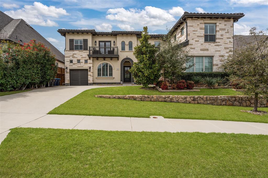 Exclusive opportunity in Walsh! Thoughtfully designed and beautifully appointed, this exceptional home blends luxury, comfort, and resort-style living in one of Walsh's most desirable locations within Aledo ISD.
Filled with natural light and designed for both everyday living and effortless entertaining, the open-concept floor plan centers around a stunning living room with custom built-ins, a fireplace, and expansive sliding glass doors that seamlessly connect the indoors to a private backyard retreat. Enjoy year-round outdoor living with a heated pool and spa, outdoor fireplace, outdoor shower, mature magnolia privacy hedge, and additional green space for pets, play, or relaxing under the Texas sky.
The chef's kitchen serves as the heart of the home, featuring a large center island, high-end appliances, abundant storage, and an effortless flow into the main living and dining spaces. A private study, formal dining room, and well-appointed guest suite with a full bath are thoughtfully positioned on the first floor, offering flexibility for work, guests, or multigenerational living.
The owner's retreat is a true sanctuary, complete with dual walk-in closets and a spa-inspired bath designed for relaxation. Upstairs, you'll find an expansive game room with wet bar, media room, additional flex living space, and two generously sized bedrooms with two full bathrooms.
Designer wallpaper, plantation shutters, elevated finishes, and a spacious three-car garage further enhance the home's sophisticated yet livable appeal.
Beyond the front door, enjoy Walsh's unmatched lifestyle amenities, including a state-of-the-art fitness center, resort-style pool, sports courts, multiple playgrounds, miles of hiking and biking trails, a private lake, dog park, neighborhood market, and on-site fuel station.
This is more than a home—it's an opportunity to experience one of the most sought-after lifestyles in North Texas.