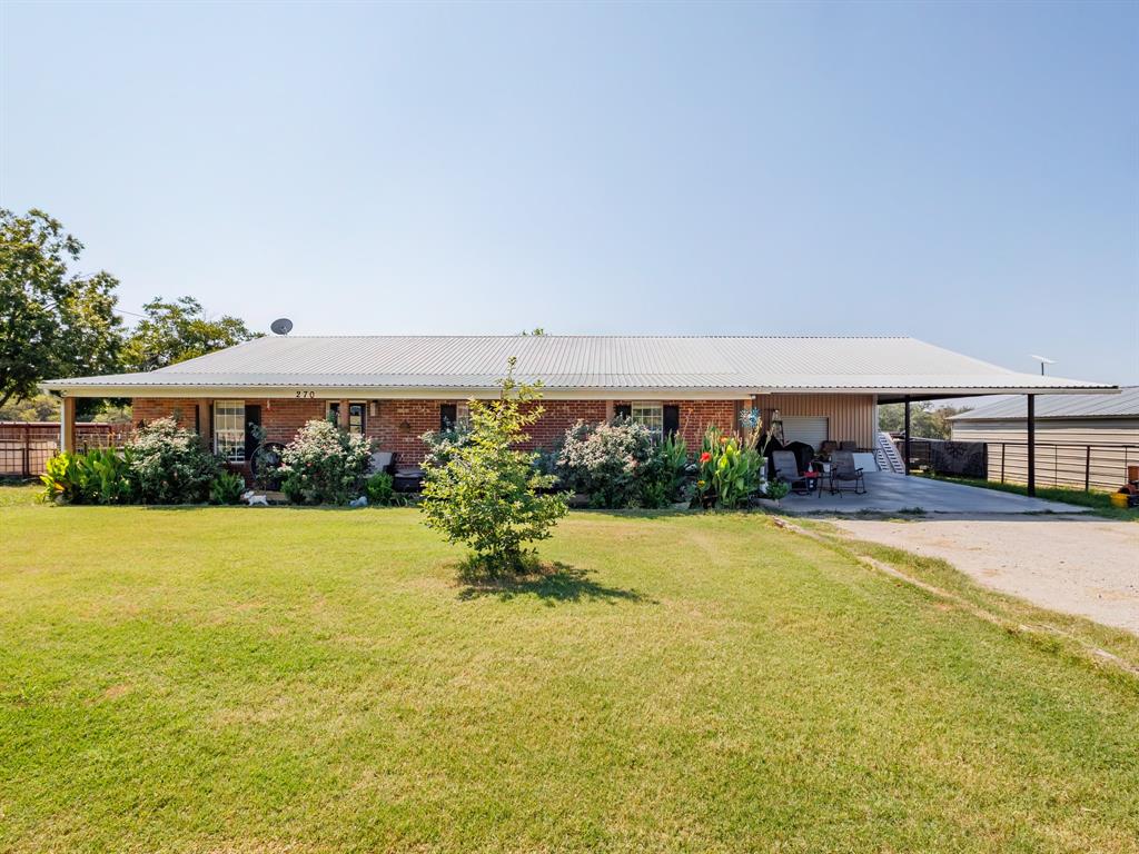Charming 3-bed, 2-bath home on nearly 4 acres in Early ISD! This updated property features an open-concept kitchen and living area with granite counters, stainless appliances, and stylish finishes throughout. Enjoy a spacious front porch, oversized carport with workshop, mature trees for shade, and plenty of room for pets or livestock. With a peaceful country setting just minutes from town, this move-in ready home offers the perfect blend of comfort and convenience.
