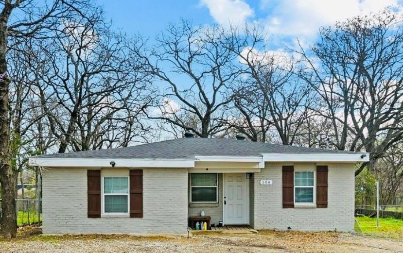 Zero carpet! Welcome to this updated 3-bedroom, 1.5-bathroom single-story home in Kennedale. Built in 1955, this property offers a practical, move-in-ready layout suitable for a variety of buyers.

Step inside to an open-concept living and dining area featuring easy-to-maintain tile flooring that flows seamlessly throughout every room in the house. The space is comfortable, functional, and equipped with ceiling fans for everyday living.

The kitchen features updated dark cabinetry, standard modern appliances, and practical counter space for meal prep. Down the hall, you will find three straightforward bedrooms painted in neutral tones. The main bathroom has been updated to include a clean, fully tiled walk-in shower.

Conveniently located on N Dick Price Road, this home provides straightforward access to local Kennedale schools, parks, and major DFW highways for an easy commute. Whether you are a first-time homebuyer looking for an accessible property or an investor seeking a solid rental addition, this home presents a great, practical opportunity.

Schedule your private showing today!