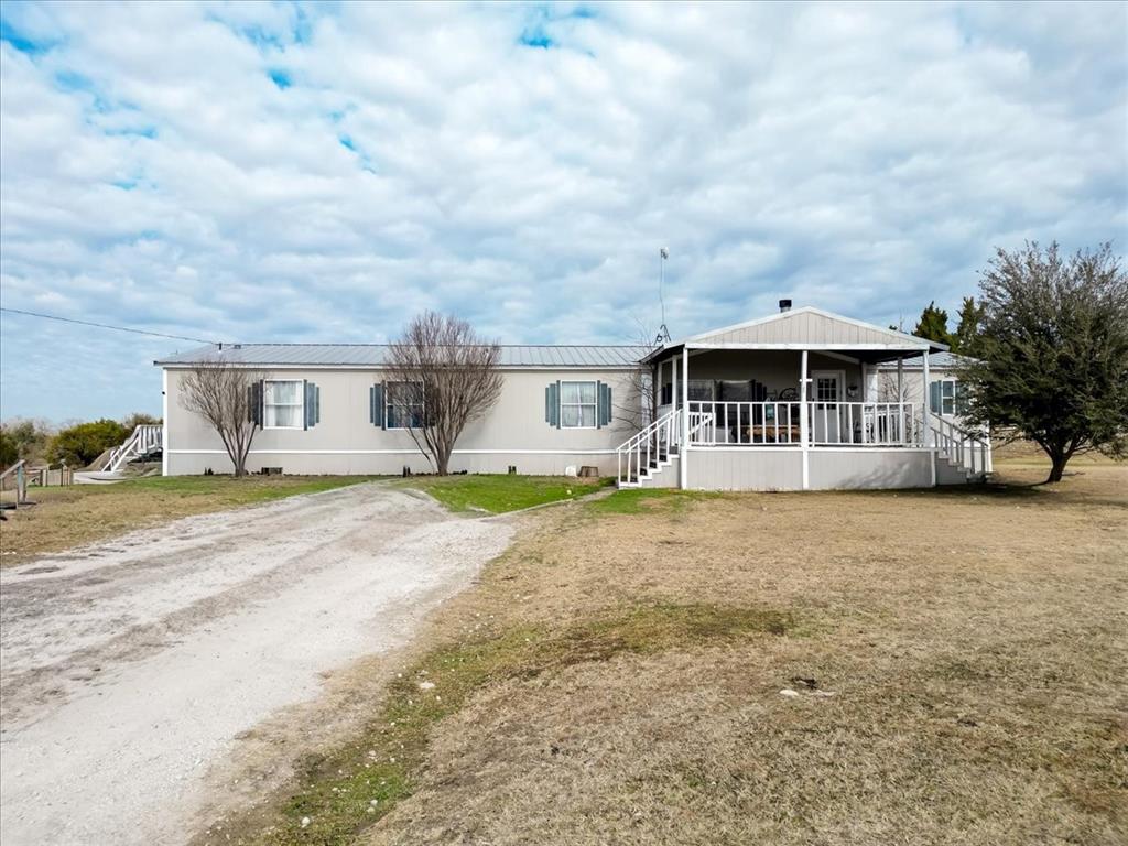 Spacious 1 Acre Property Near Granbury Fully Furnished Move In Ready and Property is Fenced Take advantage of this established 4 bedroom home built in 2001 which comes fully furnished with a new refrigerator and new range oven. Offering a clean and functional layout on a rare 1 acre lot located close in to Historic Granbury Square this property is a versatile find for families seeking space or investors looking for a high demand rental without the restrictions of an HOA.
Generous Space The full 1 acre lot provides room for outdoor activities future workshops or gardening a rare feature so close to town. There is also a separate RV 30 and 50 amp electricity hook up for guests and or additional income.
Property is Fenced The entire acre is fenced providing immediate security for pets children or equipment a significant value add for both owners and tenants.
Functional Layout This 2001 built 4 bedroom home is well maintained and nice offering a practical floor plan that is ready for immediate occupancy.
No HOA Fees or Rules Enjoy the freedom to use your land as you see fit without monthly fees or restrictive covenants.
Family and Investment Appeal Situated near top rated schools like Oak Woods School and local attractions like Lake Granbury this property serves as a stable starter home or a turnkey investment asset.