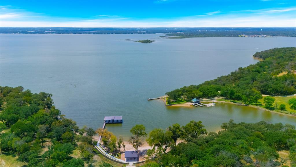 Welcome to Fleming Pointe – A Private Retreat of Natural Beauty and Luxury Living on Waterfront Lot!

Nestled among rolling hills, mature trees, and breathtaking views, Fleming Pointe is a premier gated community offering an unparalleled lifestyle of tranquility and exclusivity. Each spacious homesite provides the perfect canvas for your custom dream home, with the freedom to choose your own builder—subject to approval to preserve the architectural integrity and charm of the neighborhood.

This scenic enclave is more than just a place to live—it’s a sanctuary. Residents will enjoy access to a private, residents-only beach complete with shade structures, a floating dock, and a picnic area—perfect for peaceful retreats or gathering with neighbors. With its blend of natural beauty, privacy, and luxury, Fleming Pointe is where your vision of home truly comes to life.