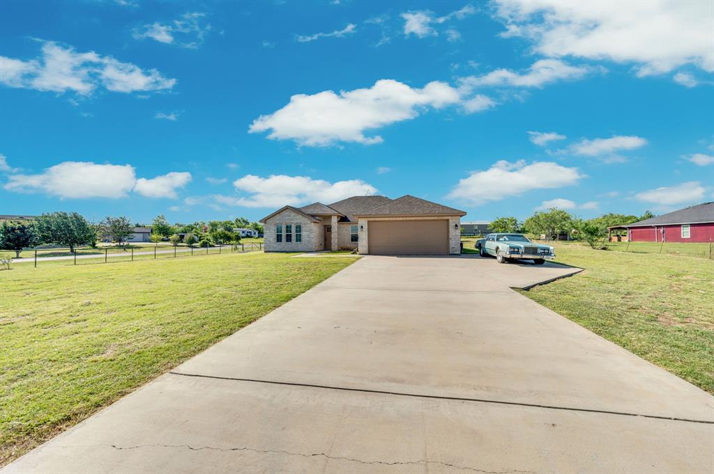 Welcome home to this beautifully maintained 3-bedroom, 2-bath home situated on a spacious 1-acre lot in Venus, Texas, within the highly sought-after Maypearl ISD. Designed with both comfort and functionality in mind, this home features a desirable split-bedroom floor plan that provides added privacy for the primary suite. The versatile office or flex space offers endless possibilities as a home office, playroom, workout room, or guest space. Enjoy entertaining in the formal dining room or gather with family in the bright breakfast area just off the kitchen. Luxury vinyl plank flooring flows throughout the home, creating a seamless, low-maintenance living space with modern appeal. The open and inviting layout is perfect for everyday living while offering plenty of room to host family and friends. Outside, you'll find a full acre of land with ample space to create your dream outdoor retreat, add a workshop, garden, or simply enjoy the peace and privacy of country living all while remaining conveniently located near shopping, dining, and major commuting routes. Don't miss the opportunity to own this exceptional property that combines space, style, and the benefits of Maypearl ISD.