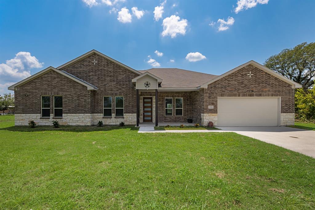Welcome home to this brand-new 2024 custom build sitting on 1.52 acres in the peaceful countryside of Corsicana, Texas. This stunning 4-bedroom, 3.5-bath single-story home offers 2,860 sq ft of modern luxury with a wide-open floor plan designed for both comfort and style. The expansive 22x22 living room flows seamlessly into a chef-inspired kitchen featuring a large island, walk-in pantry, butler’s pantry, breakfast bar, and elegant built-in cabinetry—perfect for hosting and everyday living.
The primary suite includes a spa-like ensuite with separate shower and a generous walk-in closet. A second primary bedroom with its own private bath provides the ideal setup for guests, multigenerational living, or an in-law suite. Additional bedrooms feature walk-in closets, offering plenty of storage throughout.
Enjoy the durability and beauty of luxury vinyl plank flooring, a dedicated home office, and a spacious formal dining room. Step outside to your covered front and rear porches, ideal for relaxing and taking in your private acreage. The property includes a 2-car attached garage, ample driveway parking.
Located just minutes from town with the feel of quiet country living this home is ready for you to move in and start enjoying the perfect blend of space, privacy, and modern comfort. Don’t miss out schedule your tour today!