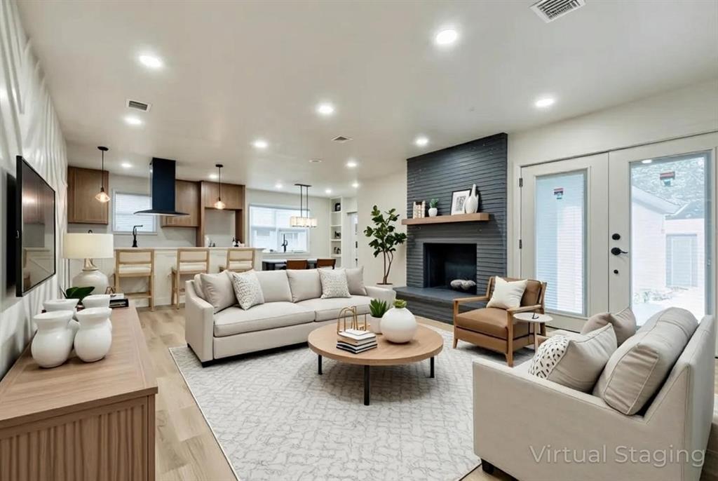 Stunning fully renovated home in the heart of Dallas! This beautifully updated property features custom accent walls in the living room and all bedrooms, creating a unique and stylish atmosphere. The open-concept kitchen boasts sleek countertops, modern fixtures, and ample cabinetry. Every bedroom includes a custom designed closet with granite accents for a luxurious touch. Enjoy the spacious dedicated laundry room with extra storage and utility space. Built-in shelving and cabinetry throughout add functionality and charm. Step outside to a large backyard perfect for entertaining, relaxing, or play. Don’t miss this move-in-ready gem with designer finishes and thoughtful upgrades in every corner!