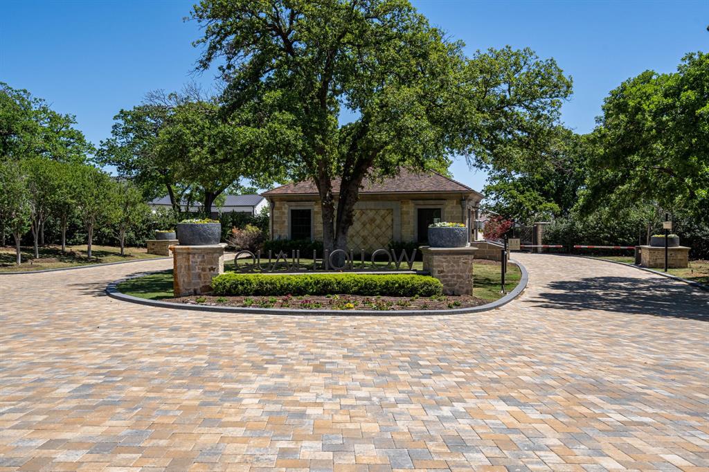 Discover the allure of this exquisite 1.01-acre residential parcel in the prestigious Quail Hollow, a haven of luxury estate living featuring a secure 24-hour gated and guarded community! Positioned in Westlake, this prime home site provides the option of enrollment in the renowned Southlake-Carroll ISD or the esteemed International Baccalaureate Westlake Academy. Enveloped by the natural beauty of a 188-acre private community, Quail Hollow stands as a picture-perfect retreat in one of North Texas's most sought-after locations. Bring your own builder, allowing you to personalize your dream residence to perfection. Embrace the Westlake, Texas lifestyle, where seclusion harmonizes with convenience, placing you in close proximity to upscale shopping, prestigious country clubs, golf courses, and a mere 15-minute drive to DFW!