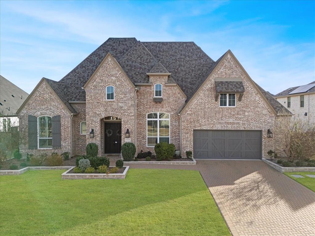 Rare opportunity to own a Highland luxury ranch on a premier 86' wide lot in the heart of Star Trails. This sought after floor plan is loaded with structural upgrades, offering the grand volume and scale of a two-story estate with the effortless flow of a single-story layout. The heart of the home is defined by soaring ceilings and an open-concept kitchen designed for entertaining.

The versatile floor plan features four generous bedrooms, 3.5 baths, a private executive study, and a dedicated media or entertainment room. Outside, the oversized 86-foot lot provides a massive backyard. Complete with a 3-car tandem garage and situated in the highly-acclaimed Prosper ISD, this home combines true luxury with the world-class amenities of the Star Trails.