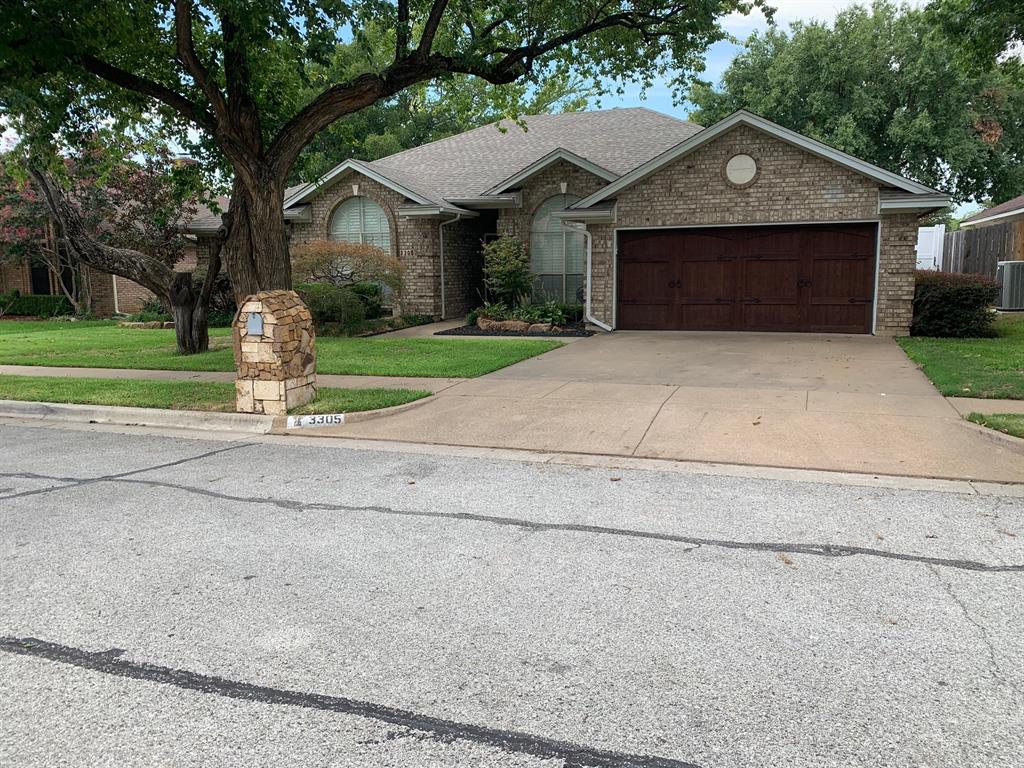 AMAZING UPDATED Executive home in Bedford off Cheek Sparger and approx. 8 minute drive puts you in the the center of Colleyville.  This remodeled 3BR-2BA home has an updated kitchen with new countertops, stainless steel appliances with refrigerator included, breakfast area, formal dining area, large living area with fireplace, game room or second living area with wet bar and wood floors. Baths have been completely updated and walk in rain showers. Covered outdoor entertainment area with built in grill and bar, pool and deck area. Updated garage with stainless steel cabinetry and flooring.