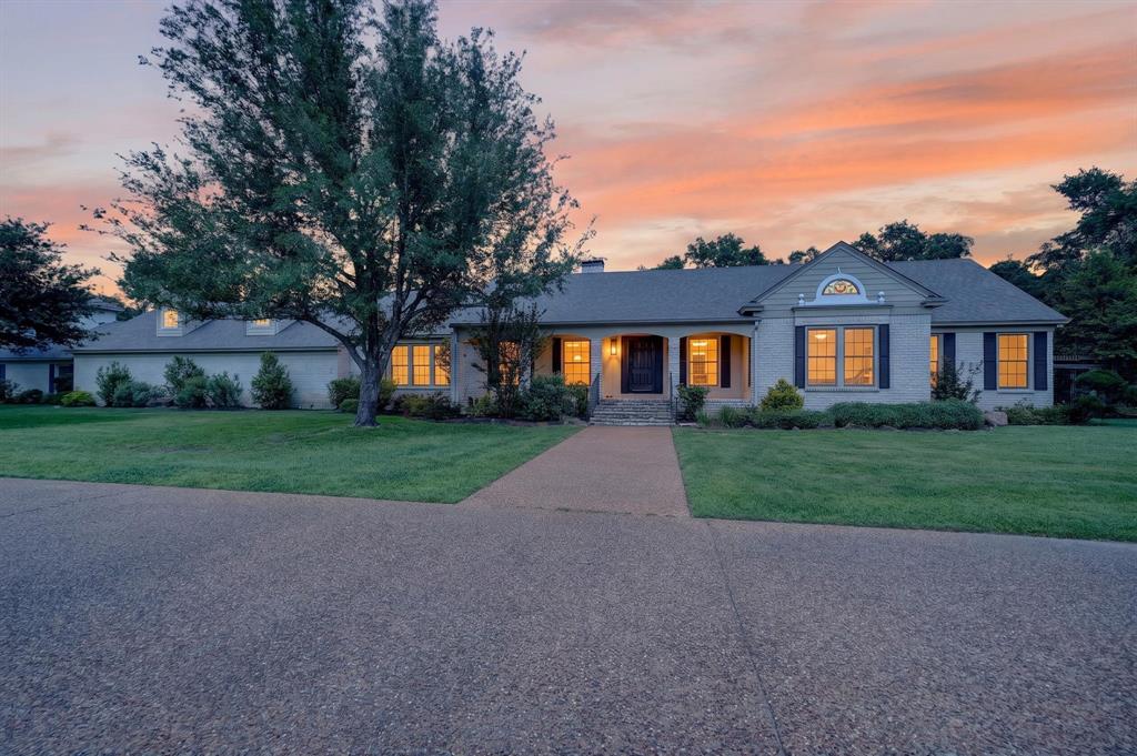Experience the kind of privacy, space, and peaceful East Texas setting that rarely becomes available on 9.05 acres in Athens. Surrounded by mature trees and abundant wildlife, this remarkable 5,920 sq ft estate offers 4 bedrooms, 3.5 bathrooms, and a park-like atmosphere designed for both entertaining and quiet relaxation. The welcoming living room features a striking marble fireplace and oversized windows that showcase beautiful views of the surrounding landscape while filling the home with natural light. The massive kitchen was built for gathering with extensive storage, incredible views, and a rare built-in brick pizza oven that creates a one-of-a-kind entertaining experience. Multiple living and dining areas throughout the home provide flexibility for hosting, relaxing, or working from home. The private primary suite offers custom carpet, custom closets, and direct access to a large private deck overlooking the serene property. Additional bedrooms and baths provide generous accommodations for guests, while the oversized bonus room with vaulted beamed ceilings and an impressive wet bar creates the perfect game room. Outdoors, enjoy new Trex decks installed in 2026, scenic walking paths, peaceful wooded surroundings, and a prestigious private road with access to the spring fed waters of Lake Athens, including a private dock area. The home was reconstructed in 2006 and also features a roof and water heater replaced in 2026. Seller is motivated and has priced the property accordingly for a quicker sale, while also offering one year of lawn service with acceptable terms plus a credit toward a home warranty. Athens is known for its small-town charm, outdoor recreation, and beautiful East Texas scenery, all within reach of the Dallas metroplex. Proudly Claim Your Piece of Texas!