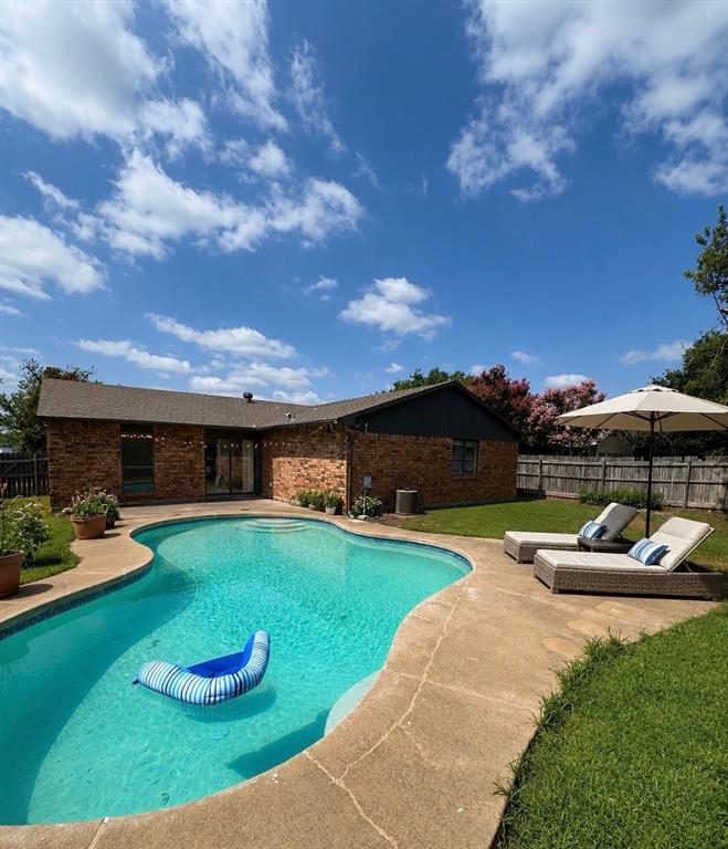 Soak up the sun in your private in-ground pool or unwind on the patio — this home was built for entertaining. The open-concept layout creates effortless indoor-outdoor flow, while vaulted ceilings, a brick wood-burning fireplace, and brand-new vinyl flooring throughout give the interior a warm, modern feel.

The beautifully updated kitchen features granite countertops, brand-new stainless steel appliances, and a charming spot for a breakfast nook — perfect for morning coffee or casual family meals. With four spacious bedrooms, there’s room for everyone. The generous primary suite is complete with a brand-new walk-in shower, large closet, and a window overlooking your backyard oasis.

Step outside to a fully fenced backyard with a sparkling blue pool, generous patio space, and a dual access gates — perfect for laid-back weekends or lively get-togethers.

Nestled in an established neighborhood near Alliance Town Center, you’ll enjoy easy access to premier shopping, dining, and entertainment. Nearby parks, walking trails, and quick highway access round out this unbeatable location.

Homes with this level of updating, a sparkling pool, and a location like this don’t come around at this price often! Schedule your showing today!