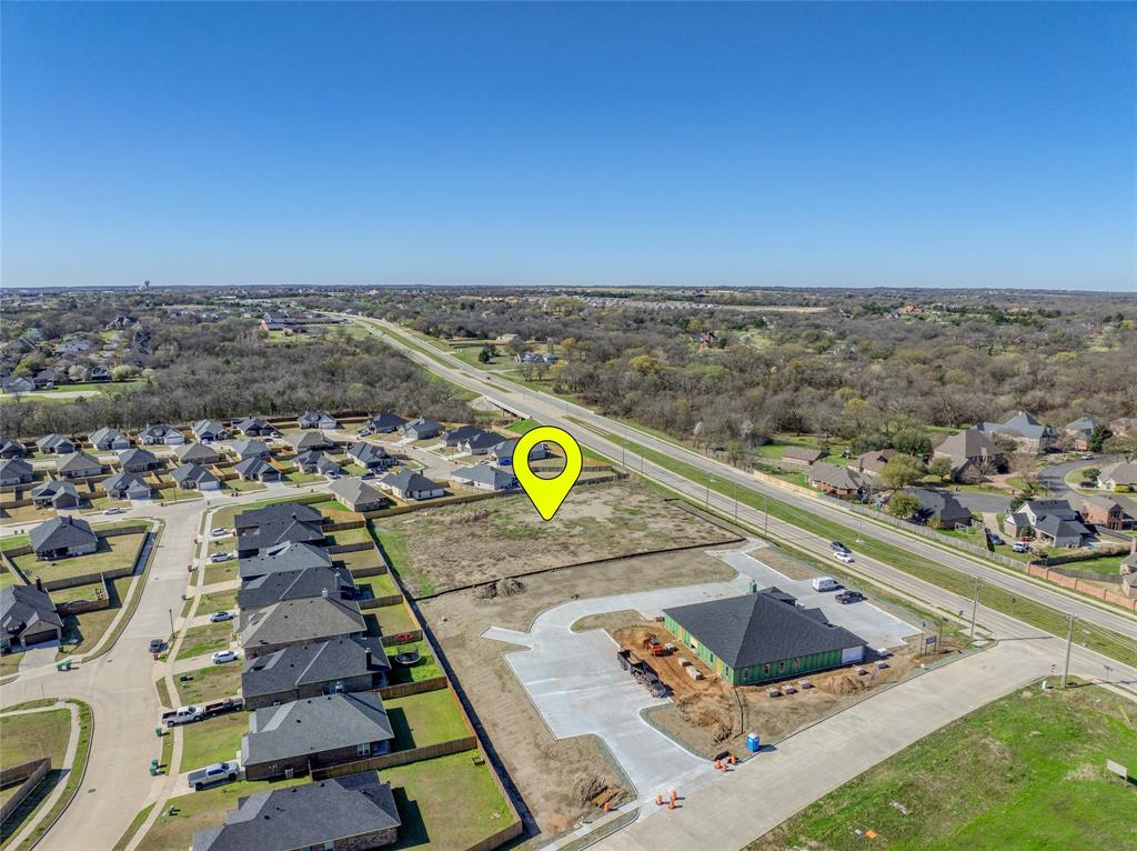 This 1.975-acre tract offers prime commercial frontage along FM 1417 (Heritage Parkway). FM 1417 is Sherman's premier growth corridor, experiencing significant expansion with new residential and multifamily development, along with major manufacturers to the south including Globitech. The site benefits from exposure to approximately 15,000 vehicles per day and is positioned along a recently widened 4-lane divided roadway. Additionally, a shared access easement is in place with the adjacent property to the north, providing secondary access from Denson Drive and enhancing site accessibility. C-N zoning allows for a wide range of commercial uses including retail, restaurant, medical office, or daycare. The location is situated less than 1.5 miles from Highway 75 (58,000 VPD), approximately 2 miles from Highway 82 (31,000 VPD), and 3 miles from Sherman High School.