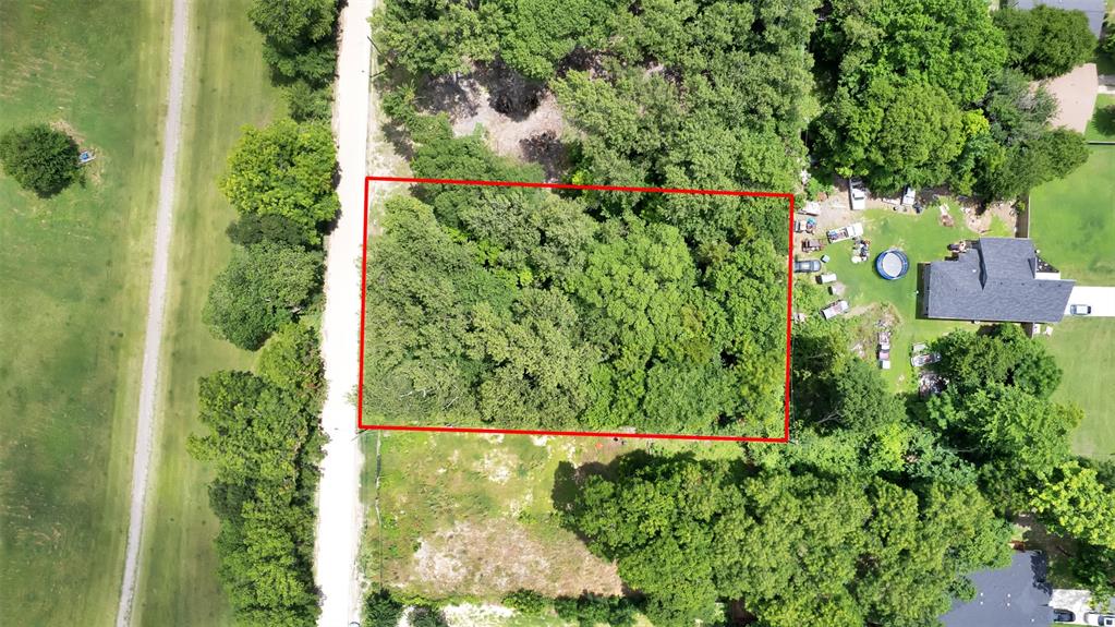 Rare opportunity to build your dream home on this beautiful, heavily wooded lot in Dallas. Nestled among mature trees and surrounded by established homes, this property offers exceptional privacy and a peaceful, park-like setting. Enjoy scenic views of the expansive green space across the street while creating your own custom retreat. With plenty of room to build and preserve the natural landscape, this unique homesite combines the tranquility of country living with the convenience of nearby shopping, dining, schools, and major highways. A truly rare find with endless possibilities in a rapidly growing area of South Dallas.
