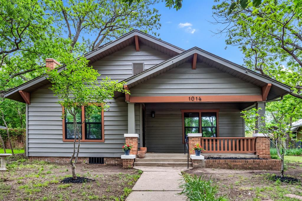 Step into timeless charm with this beautifully restored 1950s Craftsman, thoughtfully reimagined with high-end custom finishes throughout. This single-story 3-bedroom, 2-bath home seamlessly blends original character with modern luxury, featuring refinished original heart pine flooring and one-of-a-kind details you won’t find anywhere else. The gourmet kitchen is a true showstopper, complete with soft-close shaker cabinetry, Calacatta quartz countertops, an oversized porcelain farmhouse sink, a custom architectural over-sink feature, and a butler’s pantry with matching finishes - perfect for both everyday living and entertaining. The dining room showcases stunning white oak chevron-pattern built-ins, while a custom accent wall crafted from original wood sourced from the home adds a unique and meaningful touch. Enjoy beautifully detailed craftsmanship throughout, including custom trim work, Craftsman-style interior doors with oil-rubbed bronze hardware, a custom fireplace mantel with shiplap surround, and designer-inspired bathrooms featuring ribbon and Soho tile, antique bronze fixtures, and stylish finishes. The oversized laundry room offers added convenience with shaker cabinetry and a custom glass pocket door. Major updates provide peace of mind, including a brand-new HVAC system (installed November 2025), foundation repair by A+ ProLift Foundation with a 5-year transferable warranty, all-new black vinyl windows, and updated PVC plumbing. The exterior has been fully refreshed with new paint, Craftsman-style window trim, custom front porch railings, and brand-new front and back doors with oil-rubbed bronze hardware. This one-of-a-kind home is the perfect blend of historic charm and modern sophistication - truly a rare find!