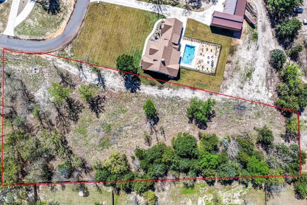 Don’t miss this rare opportunity to own the largest corner lot in Tuscany Phase II! Spanning 1.3780 acres, this prime piece of land is ready for you to build the custom home of your dreams. Ideally situated, this spacious lot offers the perfect combination of privacy, wide-open space, and peaceful country living, while still being just minutes from town and everyday conveniences. With plenty of room to create your own private retreat, this property is a unique find in a highly desirable location. Also High Speed Internet is available