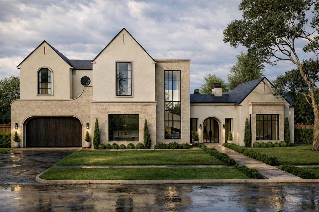 Built by BUILDTX Solutions and designed by CH Interior Design Studio , with an estimated completion of September 2026, this exceptional two-story residence offers 5,869 sq ft, thoughtfully designed with the majority of the main living areas conveniently located on the first floor.

A striking staircase framed by a large picture window creates an immediate focal point. The living room features vaulted ceilings, complemented by 12-foot ceilings throughout the first floor. A strong window package brings in abundant natural light, giving the home a bright and airy feel. Designer lighting, plumbing fixtures, and extensive millwork—primarily stain-grade—are featured throughout.

The main level includes an exercise room, private office, full guest en-suite bedroom, and a primary suite with a fireplace. The kitchen opens seamlessly to the living and dining areas, ideal for everyday living and entertaining. A covered patio overlooks the spacious lot. The home also offers a two-car front-facing garage and an additional single-car garage at the rear.

Upstairs features the remaining bedrooms, a game room, powder bath, and a flexible area for a secondary laundry setup.

Ideally located in the heart of the Disney Streets within the private school corridor.