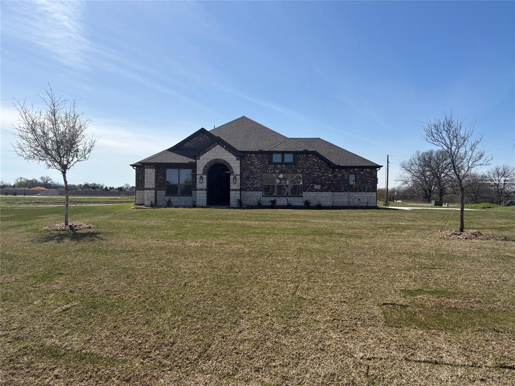1-acre cul-de-sac lot with a well-designed 3 bed, 2 bath home (1,994 sq ft). Features include wood-look tile, stone-to-mantle fireplace, quartz countertops, built-in double ovens, wood vent hood, butler’s pantry, mud bench, and an oversized 2-car garage. Built for both everyday living and long-term value.